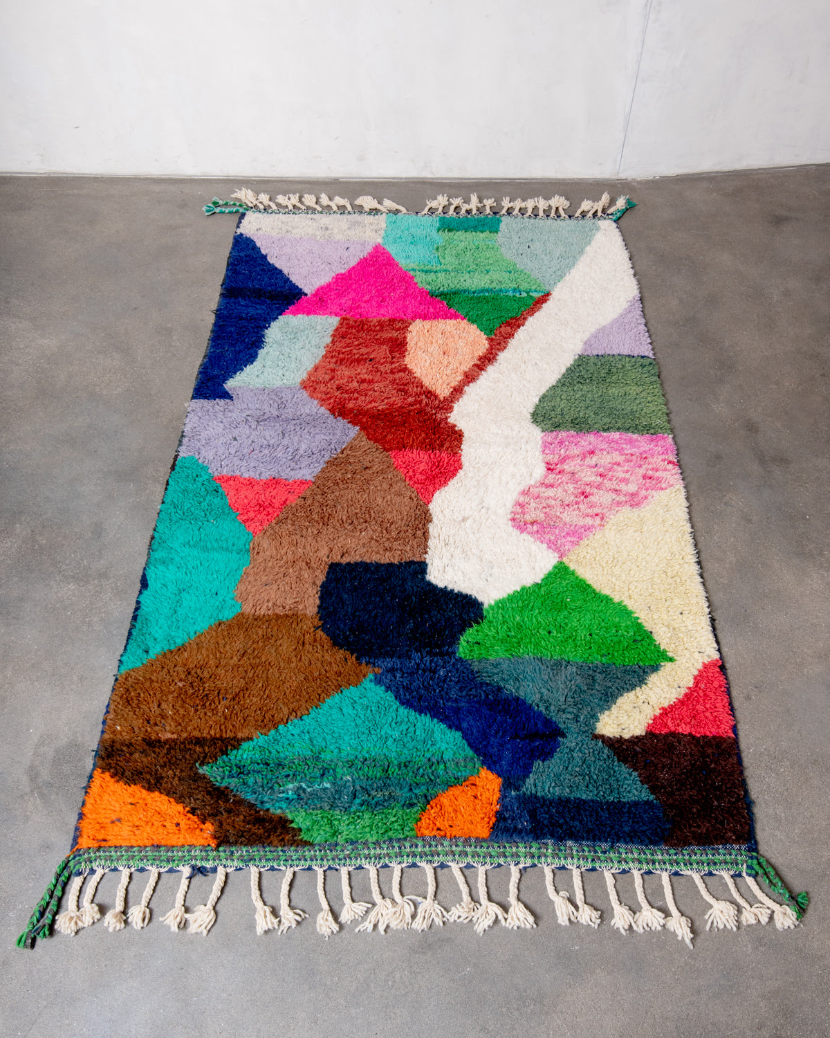Modern, designer, handcrafted Berber rug from Morocco. Beniourain carpet with beautiful colours and patterns and fluffy wool texture.
